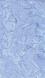Light blue marbled fabric texture with soft cloudy variations and a subtle tie-dye or batik effect.
