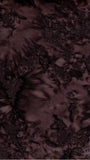 Close-up of a textured brown fabric surface