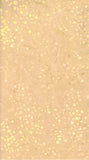 Beige  cotton batik with a scattered pattern of small yellow and pale gold dots, resembling a vintage paper texture or a glittery gold foil background.