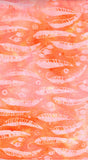 A close-up of a pink and orange patterned cotton batik fabric featuring a repeating gum leaf motif in light pink on orange.