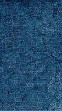 Blue patterned cotton batik fabric with geometric design