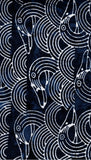 Pattern of white bird shape on a dark blue background of cotton batik fabric