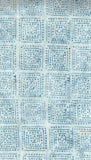 Patterned cotton batik fabric with a geometric square design in light blue on a white background