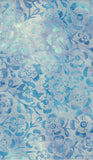 A close-up of a light blue and white batik fabric pattern featuring a repeating floral and vine motif.