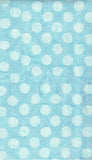 Light blue cotton batik fabric with a repeating pattern of large, hand-drawn white polka dots.