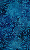 Blue patterned cotton batik fabric with swirling designs