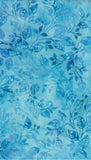 A close-up of a blue patterned fabric featuring a repeating leaf and vine motif in various shades of blue on a lighter aqua background.