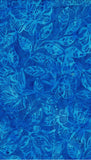 A close-up of a blue batik fabric featuring a tonal floral and leaf pattern.