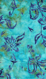 Turquoise cotton batik fabric with purple floral patterns