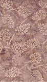A close-up of a batik fabric pattern featuring pinecones and pine needles in a dusty mauve-brown and beige colorway.