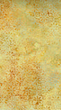 Textured cotton batik fabric with geometric pattern in yellow and green tones