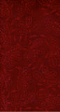 Red fabric with intricate paisley pattern