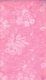 Pink cotton batik fabric with white floral patterns