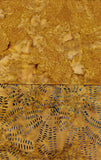 A close-up of a textured ochre batik fabric, collection of 2 Fat Quarters 