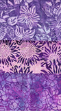 Three horizontal bands of batik fabric patterns in shades of purple, lavender, and pink, featuring floral, sunburst, and abstract cell-like motifs.