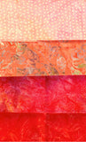 Collection of 4 Orange Fat Quarters of Batik Fabrics