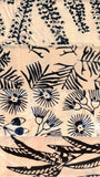 Collection of black floral and leaf patterns on a beige background cotton batik