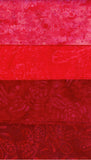 Red cotton batik fabric with floral pattern swatch
