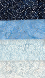Collection of blue cotton batik fabric with different patterns