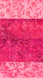Collection of pink cotton batik fabric swatches with various patterns