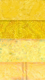 Collection of yellow fabric swatches with various patterns