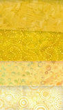 Collection of yellow fabric swatches with different patterns