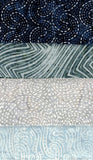 Collection of cotton batik fabric swatches with various patterns and colors.