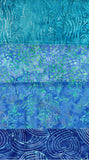 A close-up of batik fabric with five horizontal panels in shades of blue, teal, and green, featuring various organic wavy and floral patterns.
